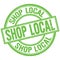 SHOP LOCAL written word on green stamp sign