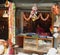 Shop seller waiting in her decoration shop in Asan market, Kathmandu