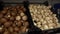 Shop shelf with fresh brown and porcini mushrooms.