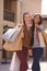 Shop shop shop. Two attractive young woman with their shopping bags after a day of retail therapy.