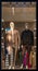 Shop vertical windows and mannequins. Fashion Store exterior. City Night Boutique. Front View from street outdoor. LED light