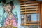 Shop wall with drawing of indigenous female in the small quaint town of  CaetÃª-AÃ§u, Chapada Diamantina, Brazil