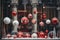 Shop window decorated for Christmas with red and white balls, sales, Christmas background