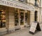 Shop window of a store selling champagne and champagne-based delicacies in downtown Reims