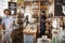 Shoppers In Dried Goods Section Of Sustainable Plastic Free Grocery Store