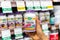 Shoppers hand holding a plastic bottle of Nature`s Way Valerian vegetarian capsules