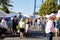 Shoppers walk through a farmers and artisan market.