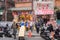 Shoppers walking through Danshui Pedestrian shopping area.