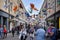 Shoppers walking under  a canopy of brightly coloured butterflies in Southgate Shopping Centre in Bath, Avon, UK