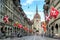 Shopping alley with the famous clocktower of Bern on Switzerland