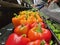 Shopping background-shopper chooses a pepper in produce section