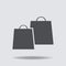 Shopping bag - vector icon. two black bags icon