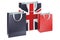 Shopping bags with British flag. Shopping in the Great Britain, concept. 3D rendering