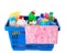 Shopping basket with different detergents and rag on white