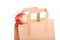 Shopping brown gift bags and apple isolated