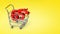 Shopping cart with 65% discount on yellow background. 65 percent discount in shopping cart with copy space. Sale concept. 3D rende