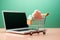Shopping cart with cloud and laptop on table. 3D rendering. Ai generative