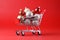 Shopping cart full of Christmas balls. Supermarket trolley with decoration, winter holidays. Christmas and New Year sale minimal