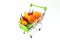 Shopping cart full of fruits and vegetables. The concept of selling and buying food.