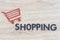 a shopping cart icon concept cut out letters, sale store business, simple minimalistic