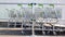 A shopping cart in a mall, used as a background image. A row of wheelbarrows for shopping at an outdoor construction supermarket