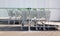 A shopping cart in a mall, used as a background image. A row of wheelbarrows for shopping at an outdoor construction supermarket