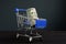 Shopping cart and roll of dollars. Money for loan and borrow cash