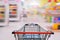 Shopping cart in supermarket. with baby safty sign on shoping car for Market Background