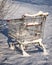 Shopping cart from the supermarket in the snow. The concept of closed stores, low demand, crisis, corontin. Consumer winter