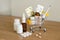 Shopping cart toy with medicaments: pills, blister packs, medical bottles, thermometer set. Health care and medicine concept