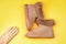shopping concept. female leather stylish footwear. pair of fashionable leather ugg boots.