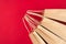 Shopping concept. Top above overhead view close up photo of four craft paperbags isolated on red background