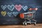 Shopping love Small cart surrounded by heart doodles on stylish blackboard
