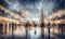 A shopping mall decorated for christmas with a large illuminated Christmas tree and busy shoppers