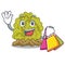 Shopping miniature green coral reef with mascot