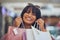 Shopping, retail and portrait of black woman in mall holding shopping bags and smile on face. Customer, luxury lifestyle