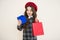 Shopping sales. parisian fashion girl. childrens day. fashionable shopaholic. kid fashion. happy girl in french beret