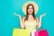 Shopping. Shopping woman excited dynamic image of young woman with shopping bags. Isolated on color background.