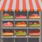 Shopping stands with meat products in baskets. Supermarket shelves with sausages and c chicken drumsticks, ham and bacon