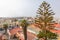 Shopping street with lighthouse at the back, view of the tower of the Woermann House, Swakopmund, Namibia.