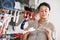 Shopping in supermarket. Woman choosing kitchenware