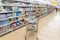 A shopping trolley stands in the department of children`s toys in a supermarket