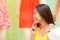 Shopping woman looking at window display at store