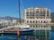 Shops of famous luxury brands, sailboats and hotels in marina in Porto Montenegro