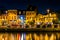 Shops and restaurants at night in Fells Point, Baltimore, Maryland.