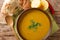 Shorbat Adas Middle Eastern Lentil puree soup closeup in the bowl. Horizontal top view