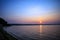 Shore of the lake in the evening, the trail of the sun, lake uvil`dy, South Urals