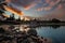 Shore of Payette Lake in McCall Idaho with sunset colors over hotel