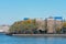 Shoreline of Astoria Queens New York with Public Housing Buildings and the East River with Colorful Autumn Trees