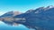 Shoreline of lake Wakatipu and its surrounding mountain ranges